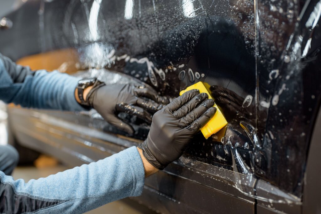 Filming car body at the vehicle service